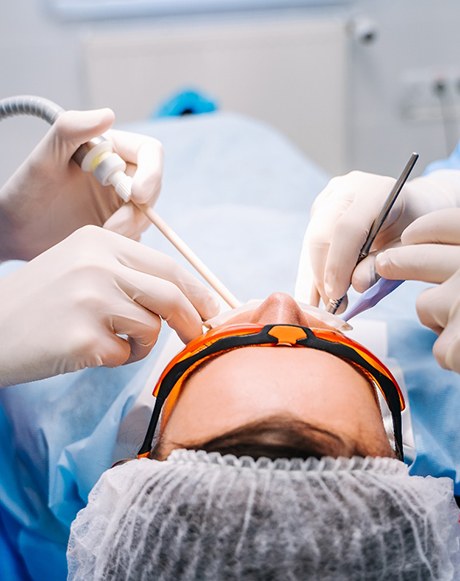 Patient undergoing tooth extraction