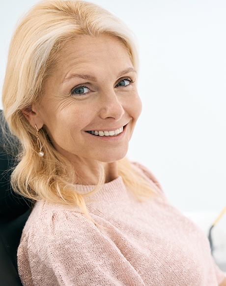 Woman smiling in the dental chair